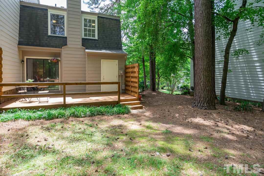 1318 Springlawn Court Raleigh, NC 27609 - Photo 23 of 30 a view of a house with a yard