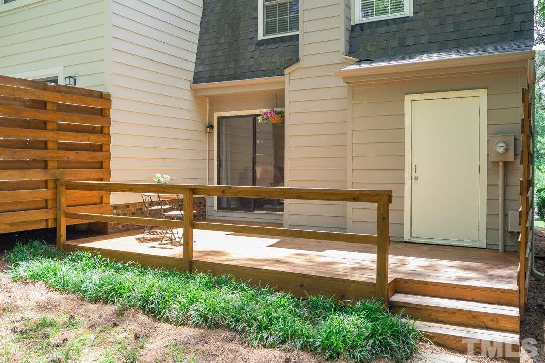 1318 Springlawn Court Raleigh, NC 27609 - Photo 24 of 30 a view of a house with backyard and sitting area