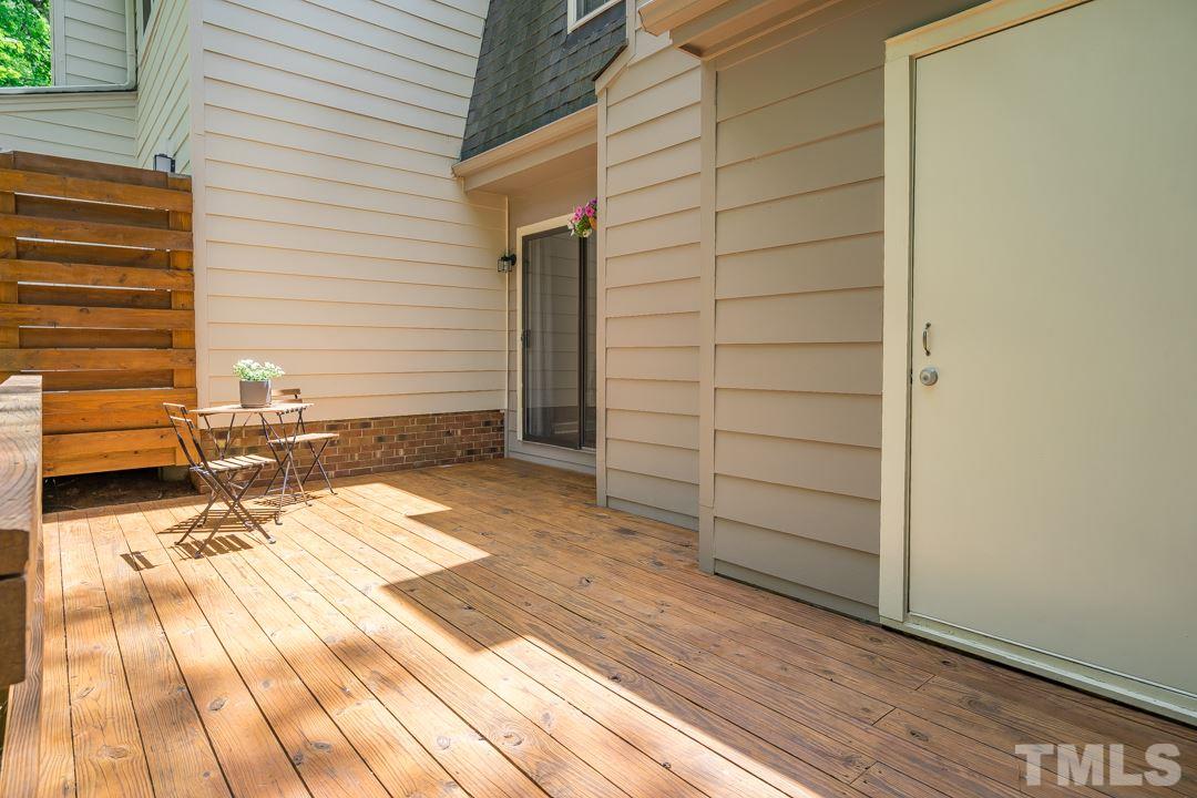 1318 Springlawn Court Raleigh, NC 27609 - Photo 25 of 30 a view of a patio with wooden floor