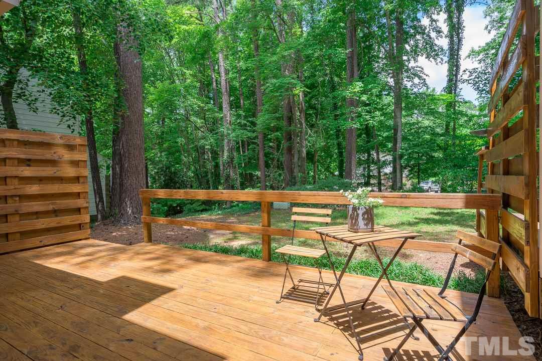 1318 Springlawn Court Raleigh, NC 27609 - Photo 26 of 30 a view of a swimming pool with a patio