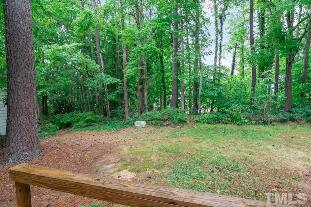 1318 Springlawn Court Raleigh, NC 27609 - Photo 27 of 30 a view of backyard with green space