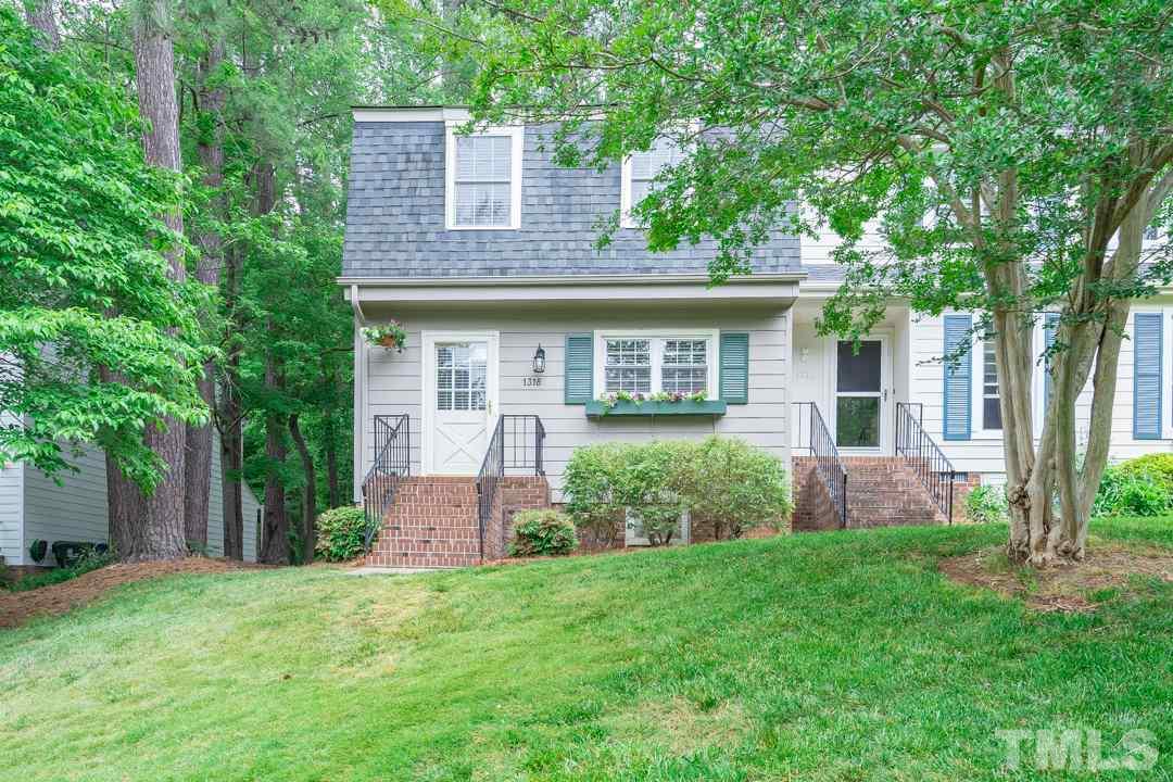1318 Springlawn Court Raleigh, NC 27609 - Photo 29 of 30 front view of a house with a yard
