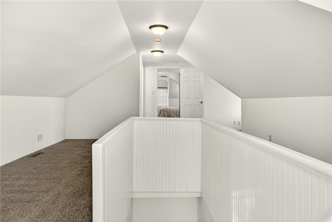 107 Riverside Drive Piqua, OH 45356 - Photo 31 of 69 This cozy attic space provides versatile living options.