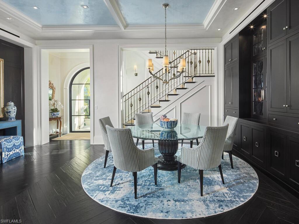 167 4th Street North Naples, FL 34102 - Photo 6 of 33 a view of a dining room with furniture window and wooden floor