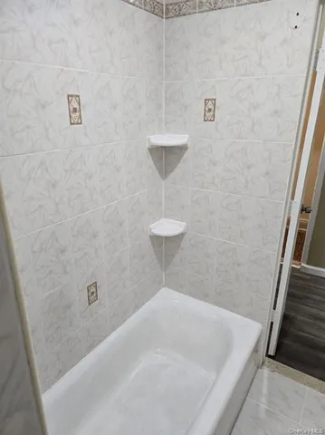 a bathroom with a sink and a shower