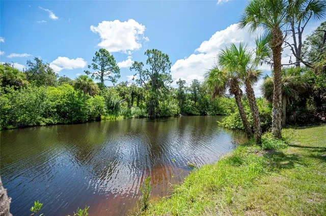 a lake view with a garden