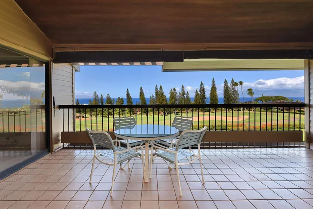 a view of a terrace with outdoor seating
