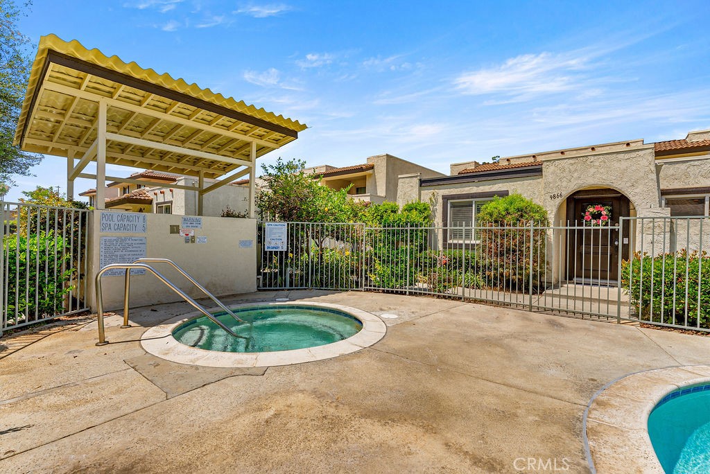 9866 Lido Way, Unit 20 Cypress, CA 90630 - Photo 20 of 24 a view of a chair and table in the patio