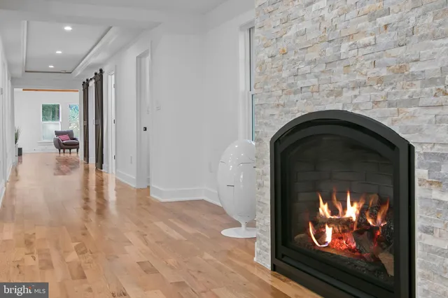 a bathroom with a shower sink vanity and toilet