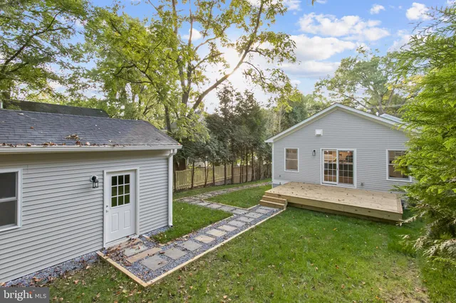 a view of backyard of a house