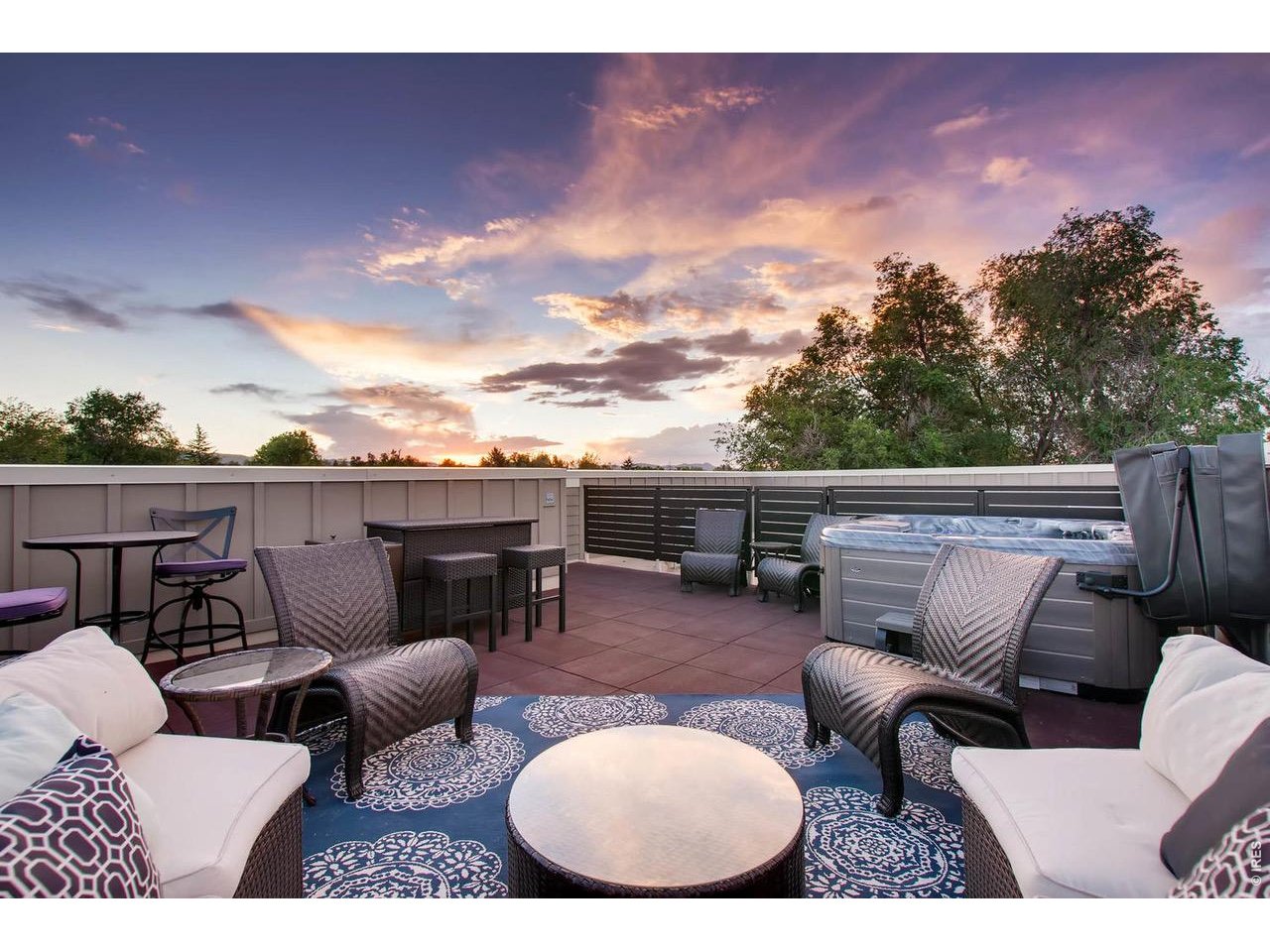 315 North Howes Street Fort Collins, CO 80521 - Photo 27 of 43 a balcony with furniture and a rug