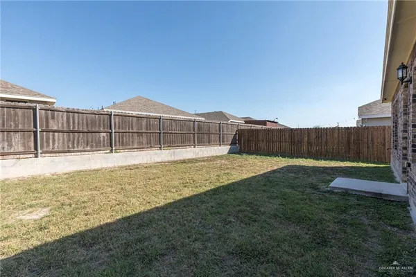 a view of a backyard with a small cabin