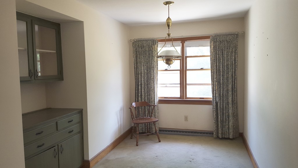 409 Lake Street Haverhill, MA 01832 - Photo 11 of 25 a view of an empty room with a window