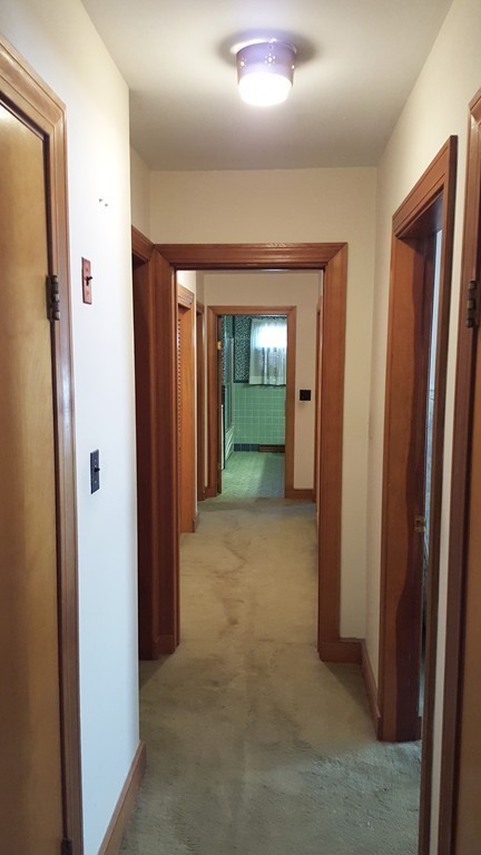 409 Lake Street Haverhill, MA 01832 - Photo 15 of 25 a view of a hallway with an entryway