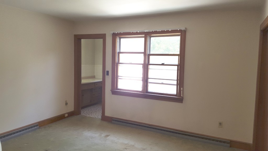 409 Lake Street Haverhill, MA 01832 - Photo 16 of 25 an empty room with a window