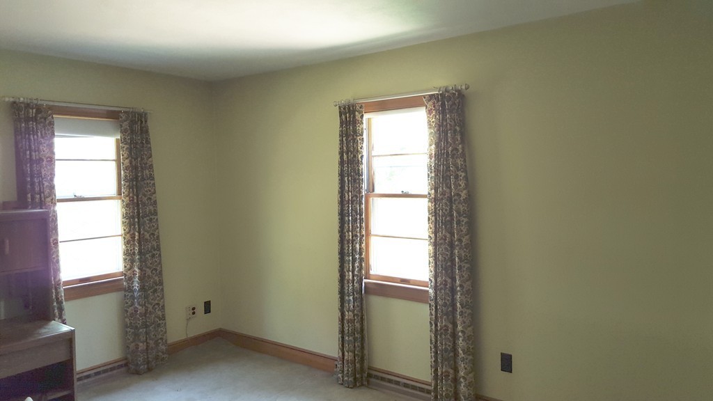 409 Lake Street Haverhill, MA 01832 - Photo 19 of 25 an empty room with windows