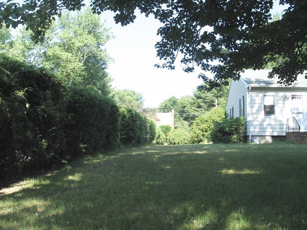 409 Lake Street Haverhill, MA 01832 - Photo 7 of 25 a view of a trees in a yard