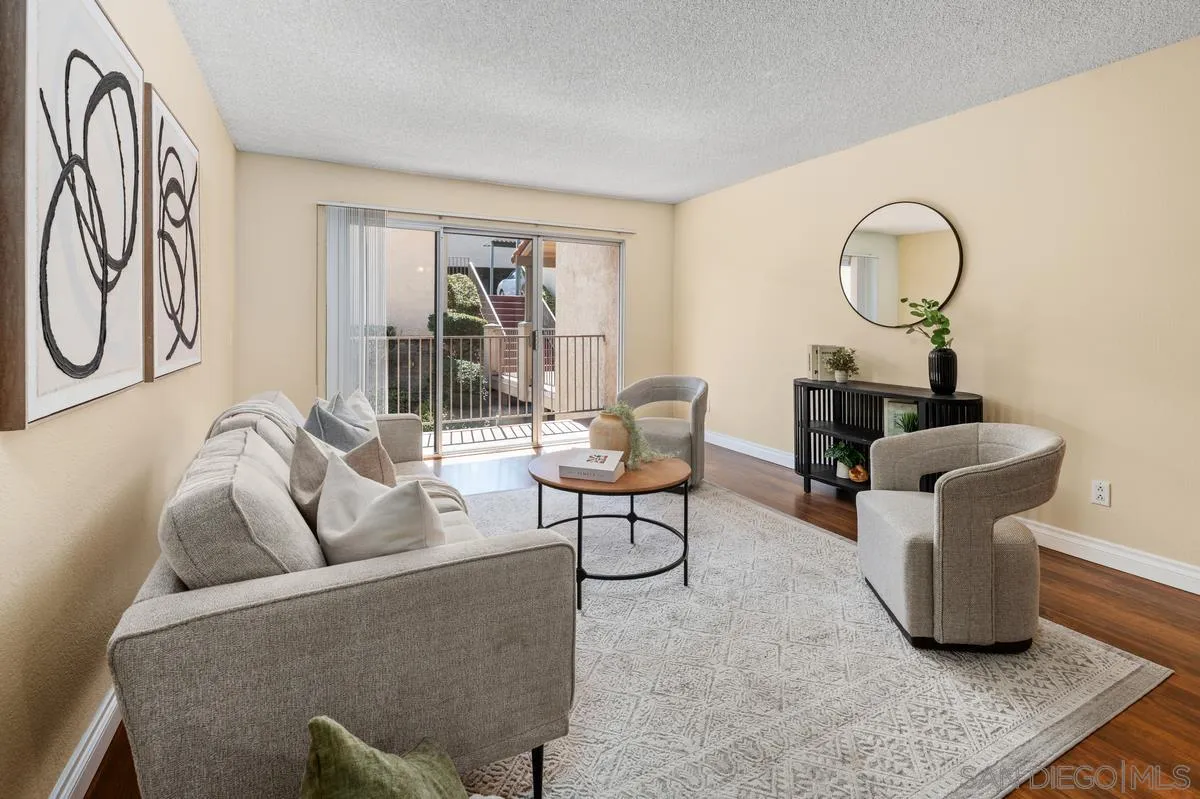 a living room with furniture and a window