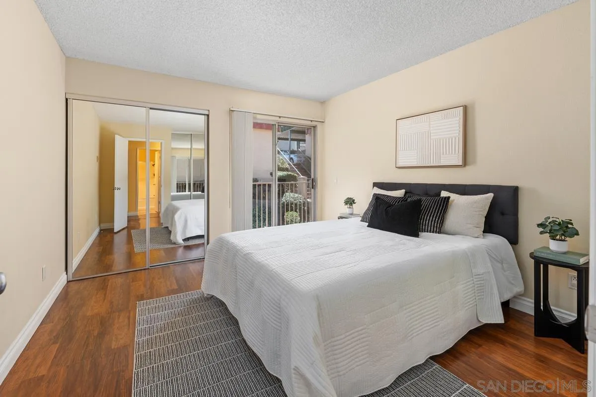 2332 Hosp Way, Unit 207 Carlsbad, CA 92008 - Photo 16 of 31 a bedroom with bed and window