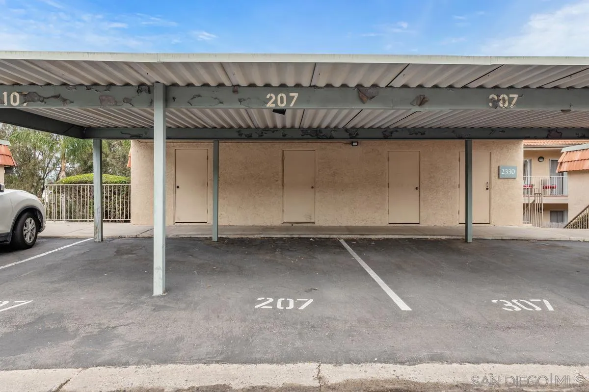 2332 Hosp Way, Unit 207 Carlsbad, CA 92008 - Photo 20 of 31 a view of a car garage both side of the road
