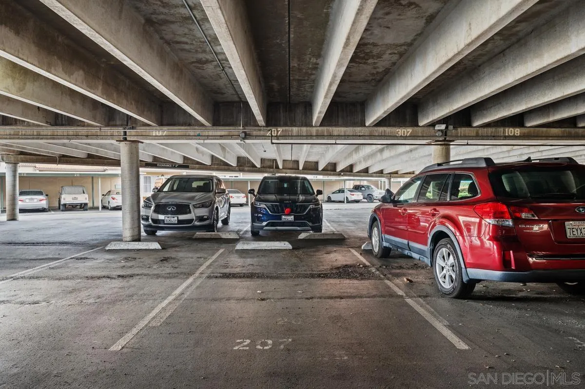 2332 Hosp Way, Unit 207 Carlsbad, CA 92008 - Photo 21 of 31 a view of parking garage with cars parked