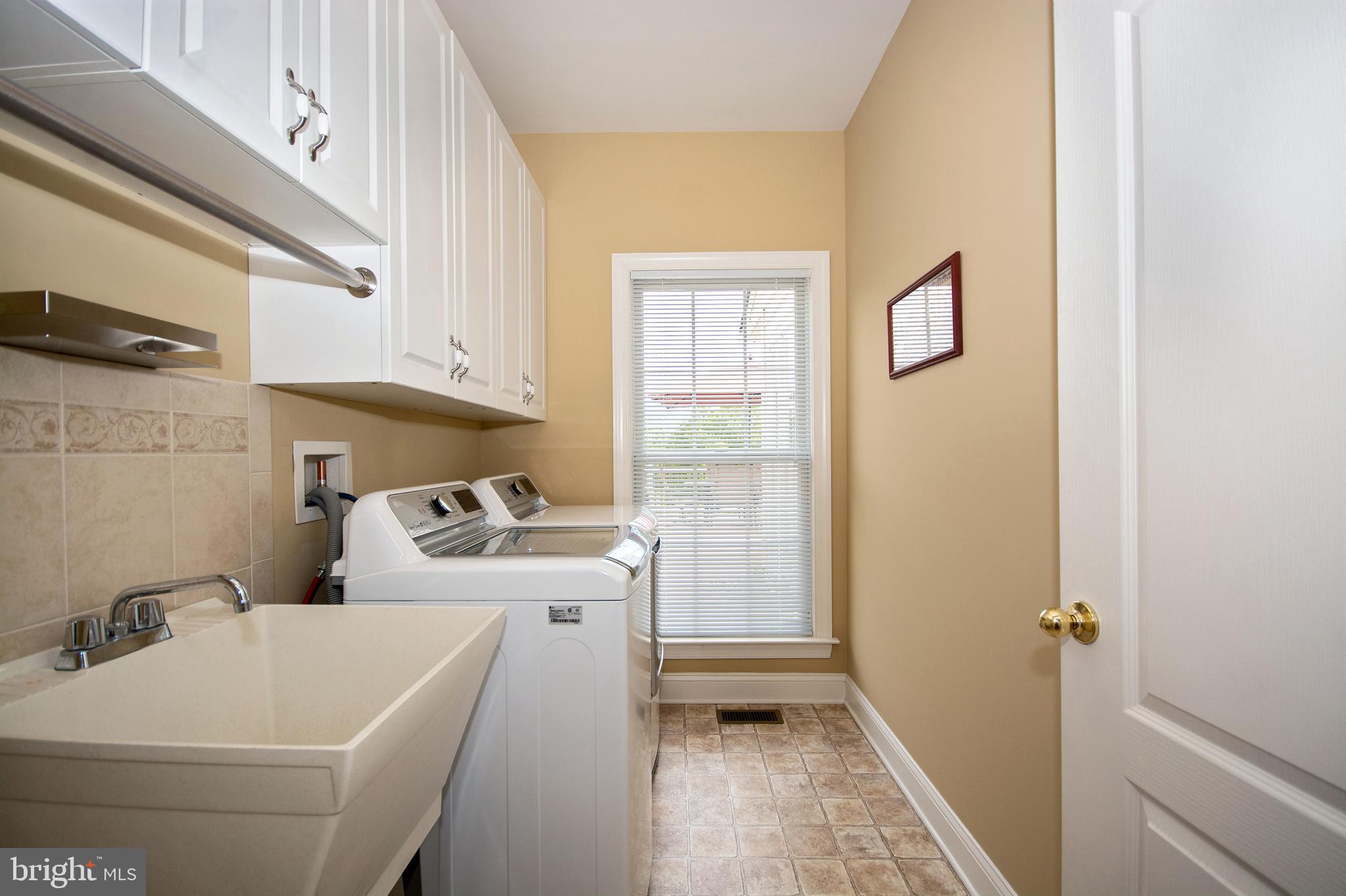 1412 Martin Meadows Drive Fallston, MD 21047 - Photo 16 of 41 Mud room with top load washer and dryer