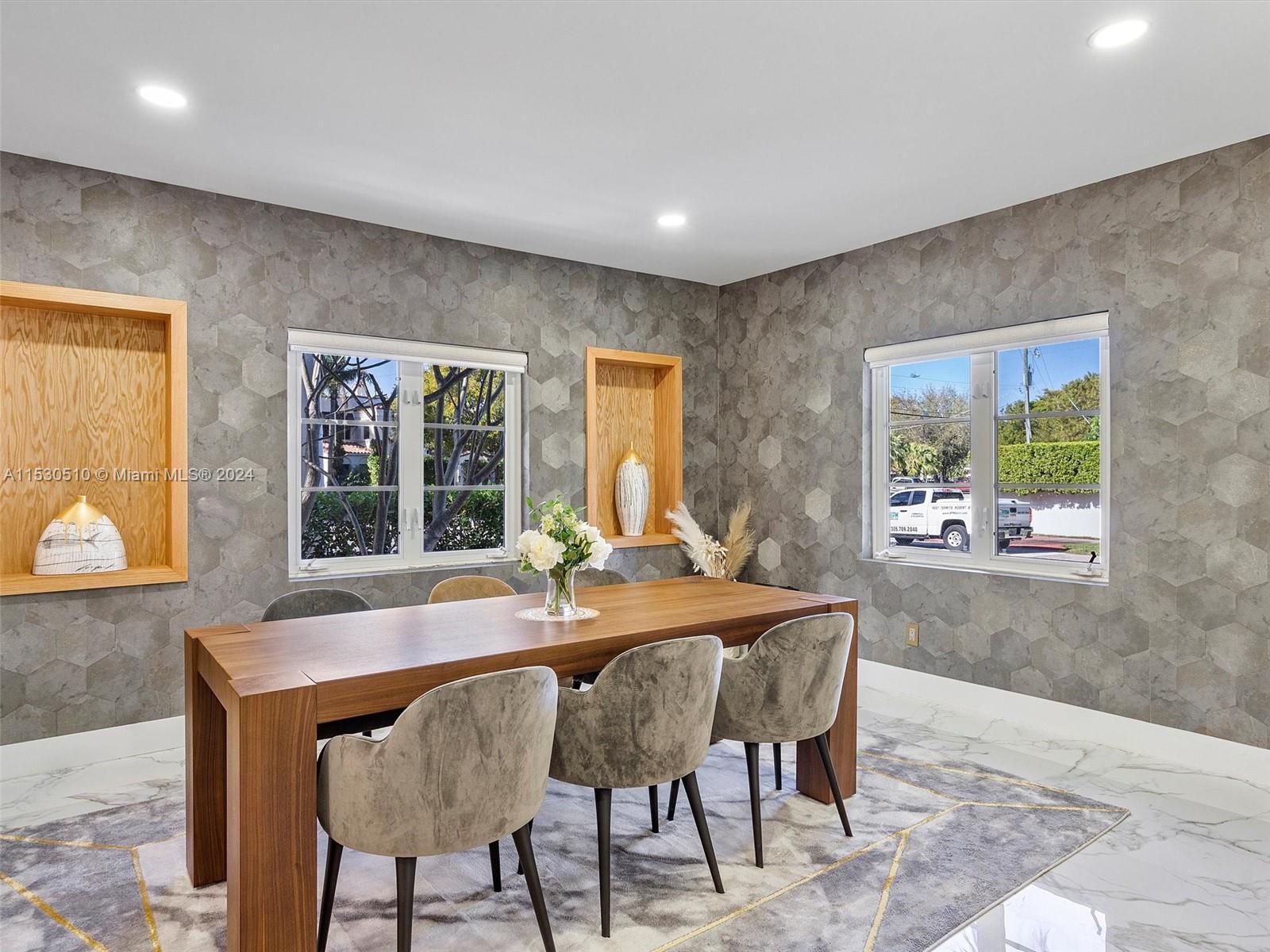 4431 Alton Road, Unit 1 Miami Beach, FL 33140 - Photo 22 of 60 a view of a dining room with furniture and window