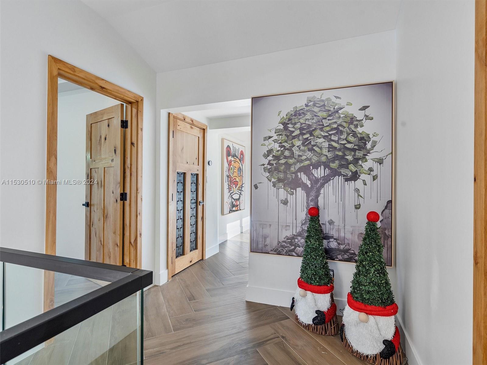 4431 Alton Road, Unit 1 Miami Beach, FL 33140 - Photo 25 of 60 a living room with furniture and wooden floor