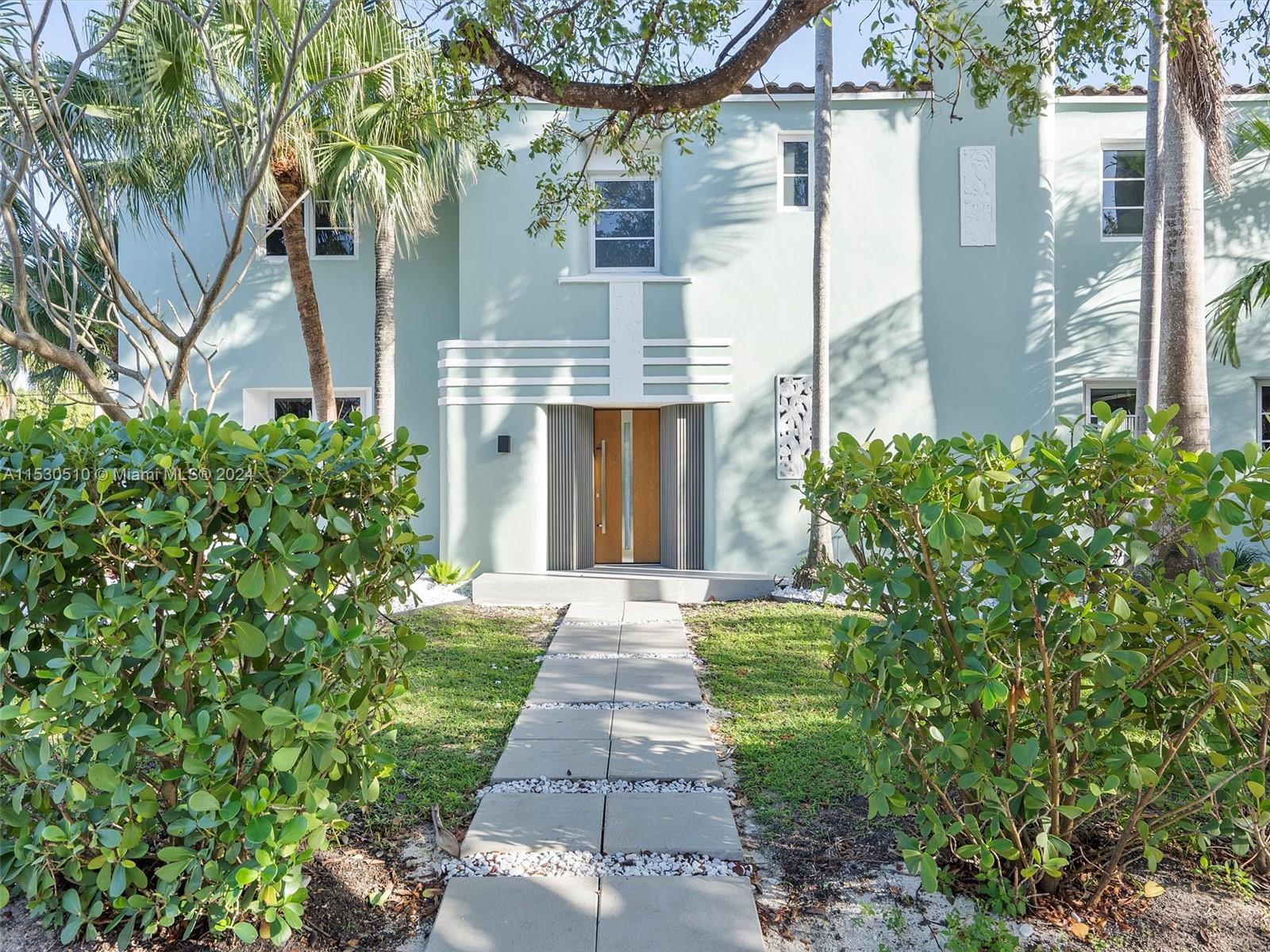 4431 Alton Road, Unit 1 Miami Beach, FL 33140 - Photo 60 of 60 a front view of a house with garden