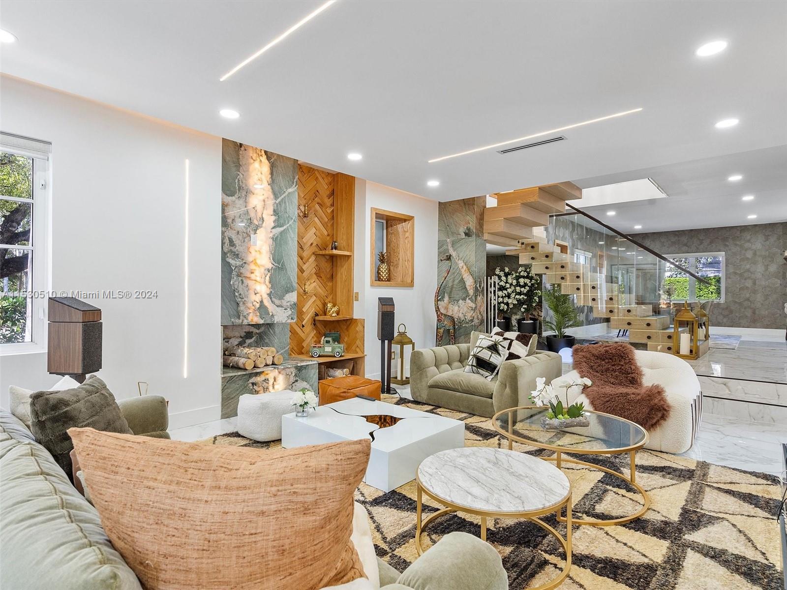 4431 Alton Road, Unit 1 Miami Beach, FL 33140 - Photo 8 of 60 a living room with furniture and a large window