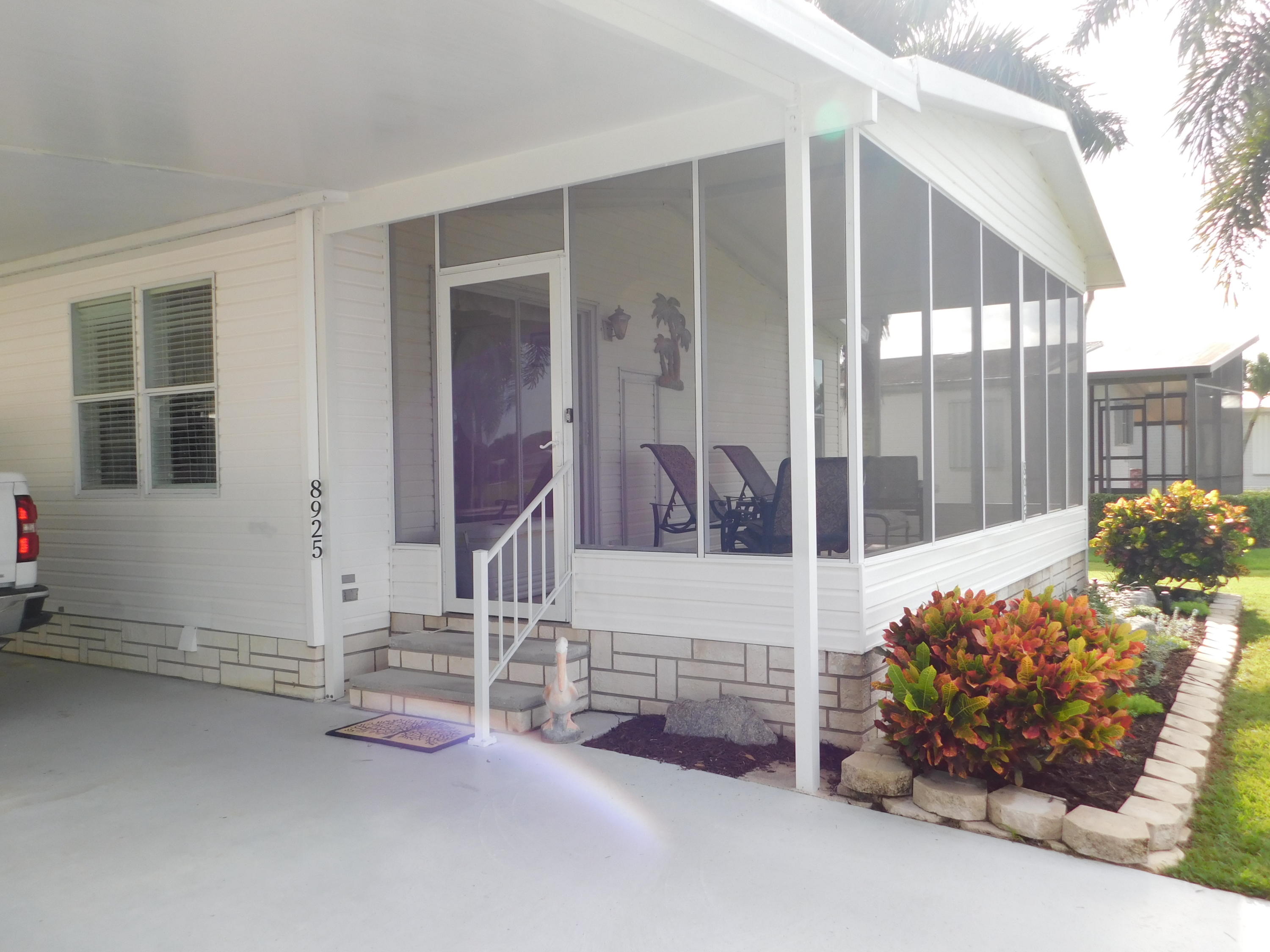 8925 Southwest Chevy Circle Stuart, FL 34997 - Photo 1 of 72 Front