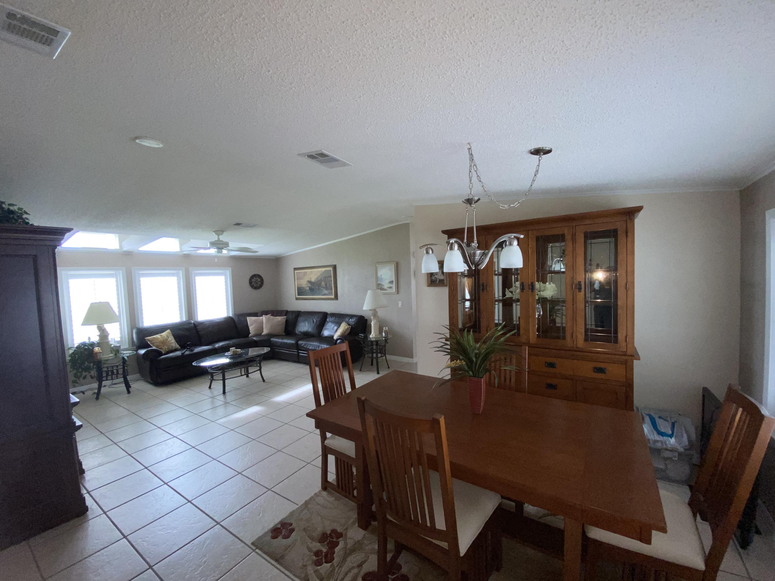 8925 Southwest Chevy Circle Stuart, FL 34997 - Photo 26 of 72 Dining - Living room