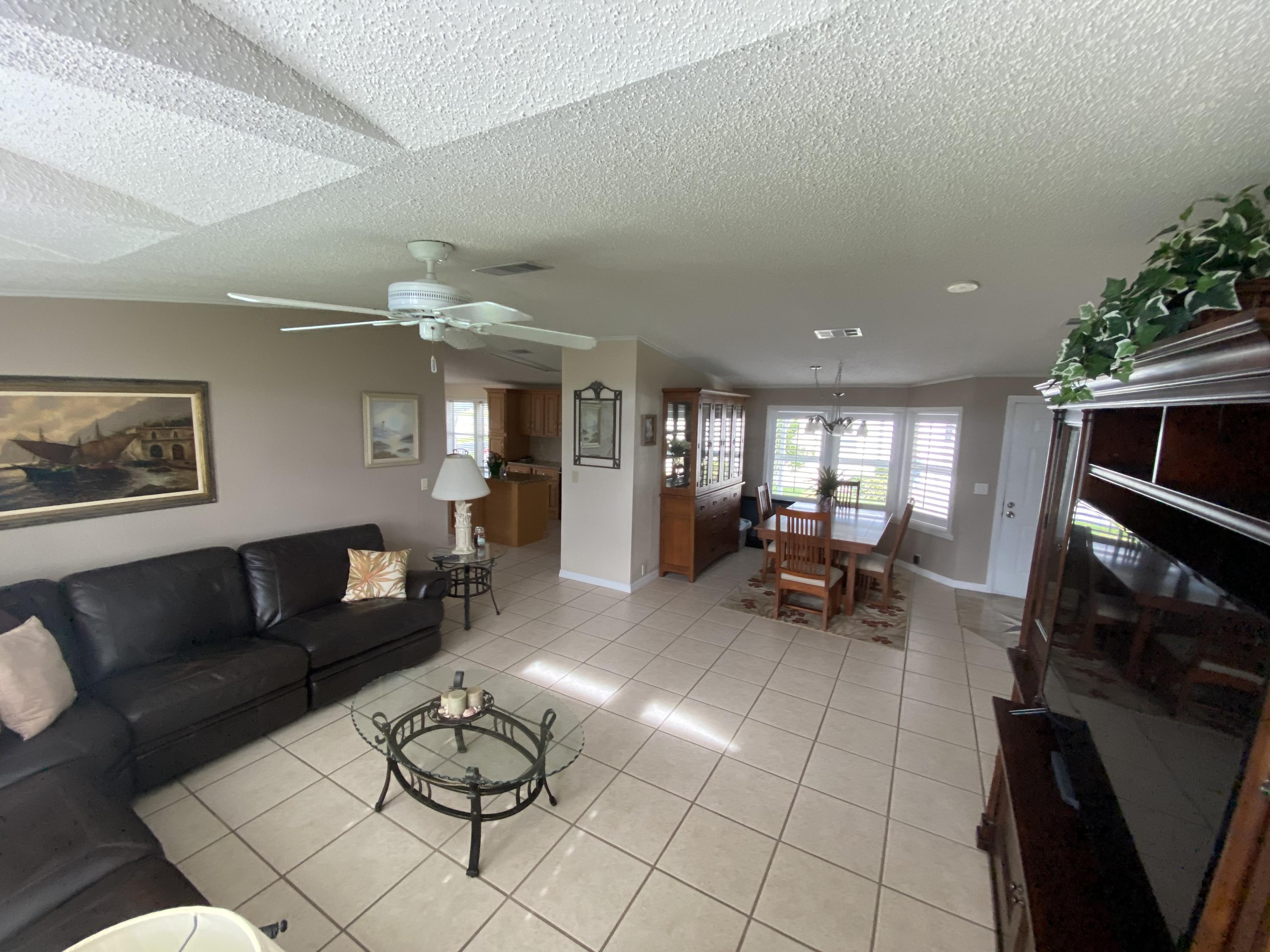 8925 Southwest Chevy Circle Stuart, FL 34997 - Photo 29 of 72 Dining - Living room
