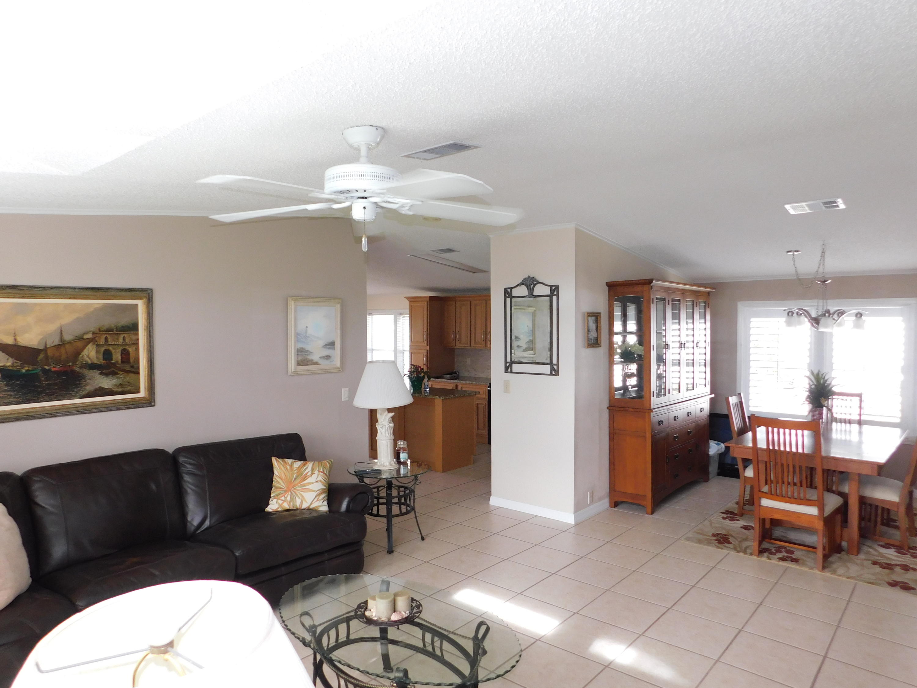 8925 Southwest Chevy Circle Stuart, FL 34997 - Photo 30 of 72 Dining - Living room