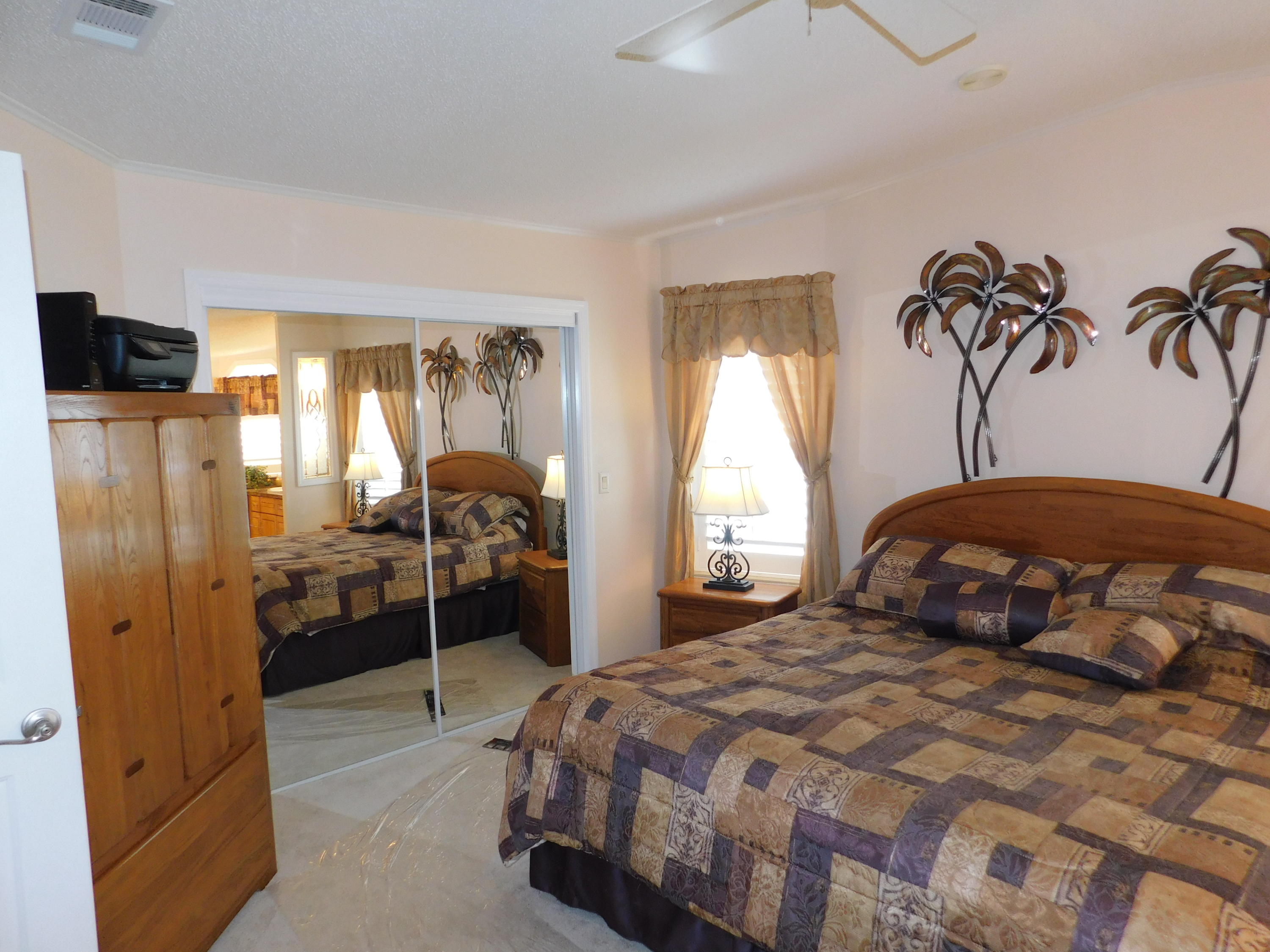 8925 Southwest Chevy Circle Stuart, FL 34997 - Photo 33 of 72 Master Bedroom