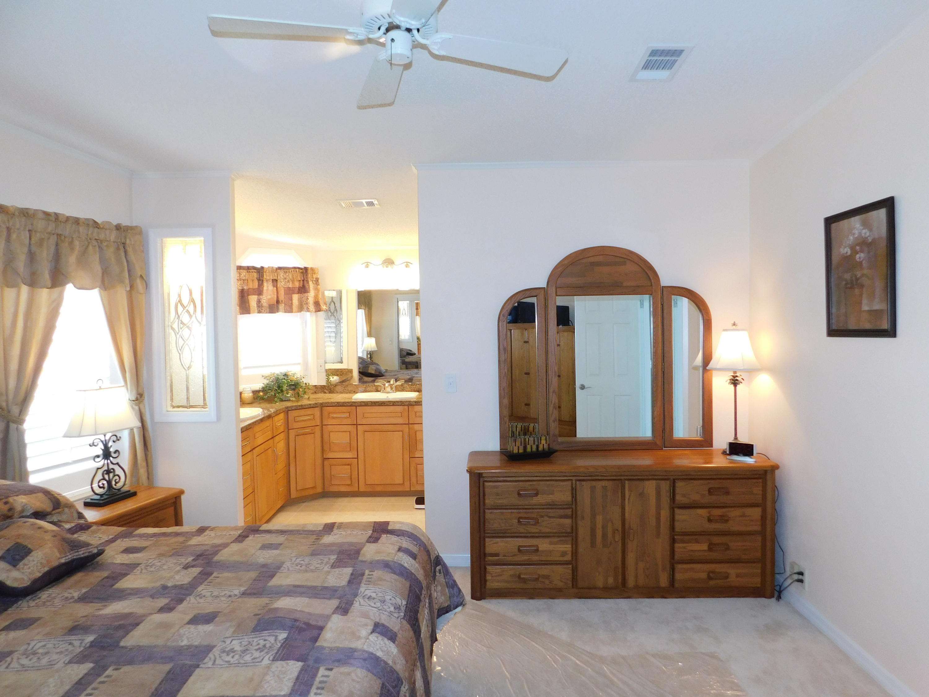8925 Southwest Chevy Circle Stuart, FL 34997 - Photo 35 of 72 Master Bedroom