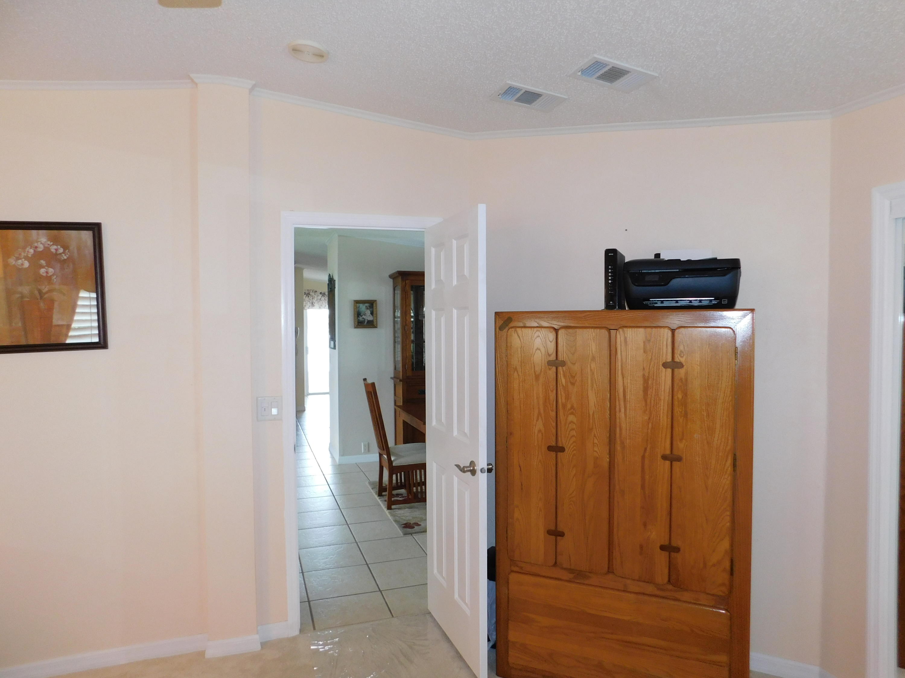 8925 Southwest Chevy Circle Stuart, FL 34997 - Photo 36 of 72 Master Bedroom