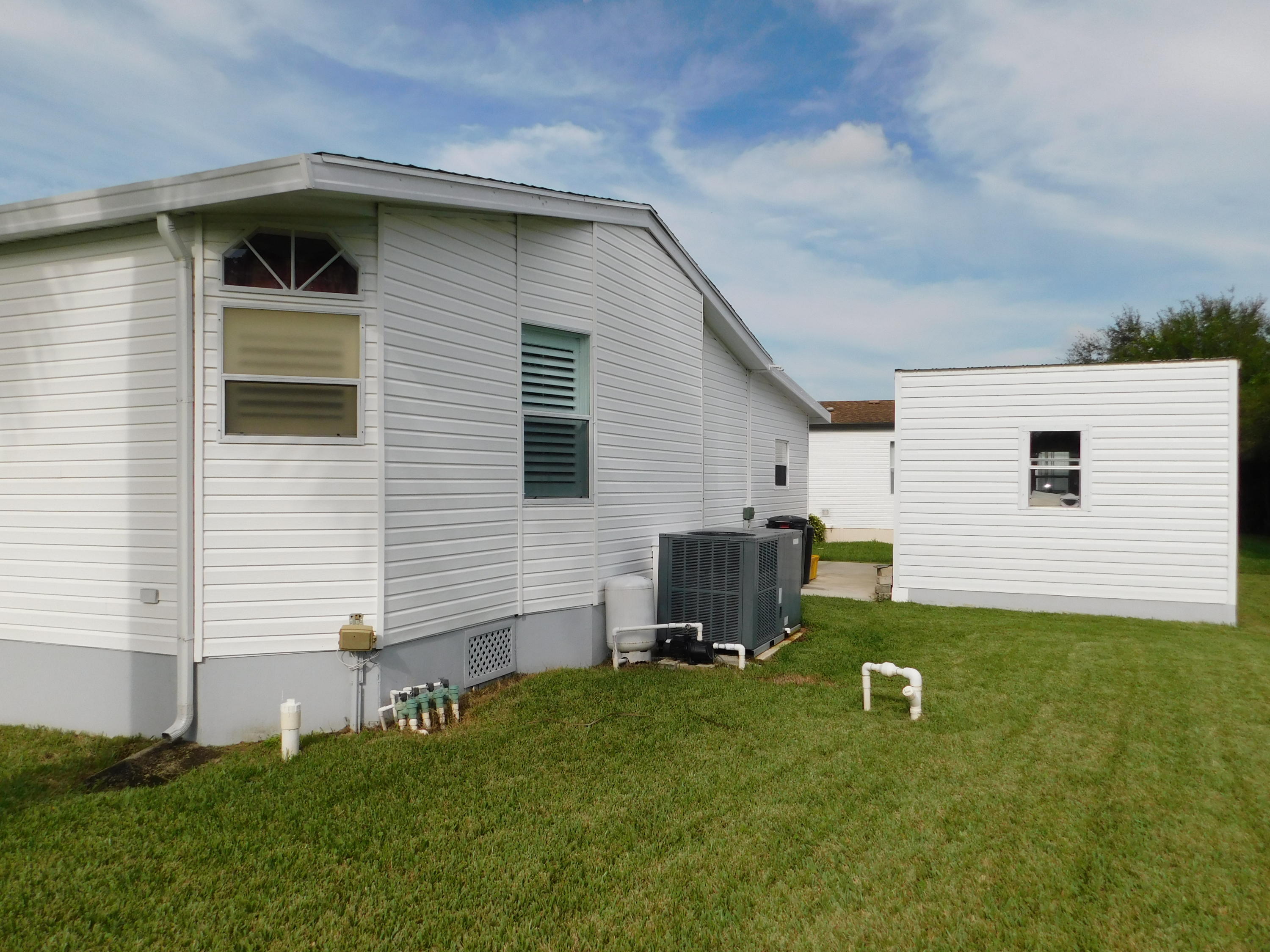 8925 Southwest Chevy Circle Stuart, FL 34997 - Photo 5 of 72 Rear