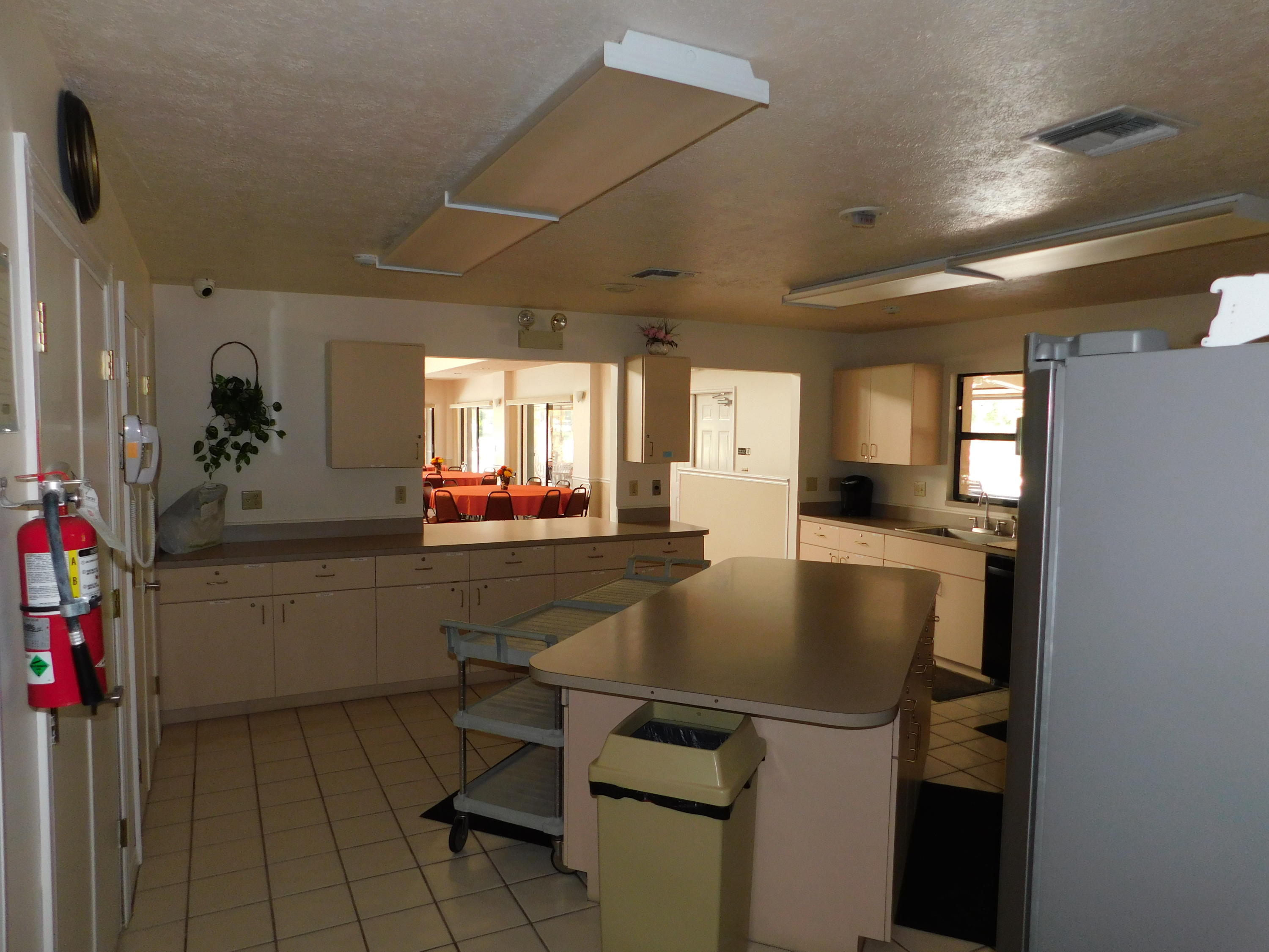 8925 Southwest Chevy Circle Stuart, FL 34997 - Photo 57 of 72 Club House Kitchen
