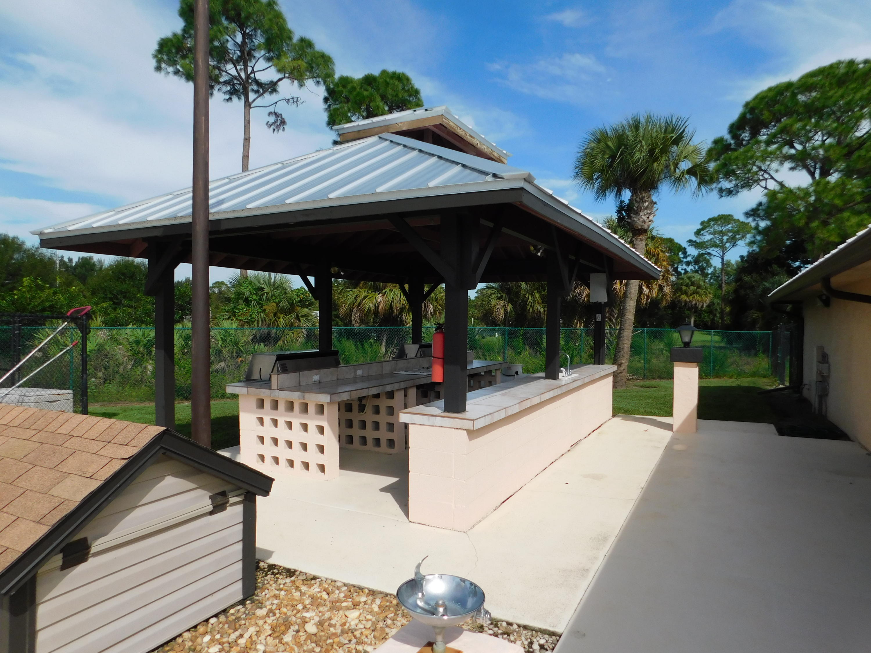 8925 Southwest Chevy Circle Stuart, FL 34997 - Photo 59 of 72 Club House outdoor Kitchen