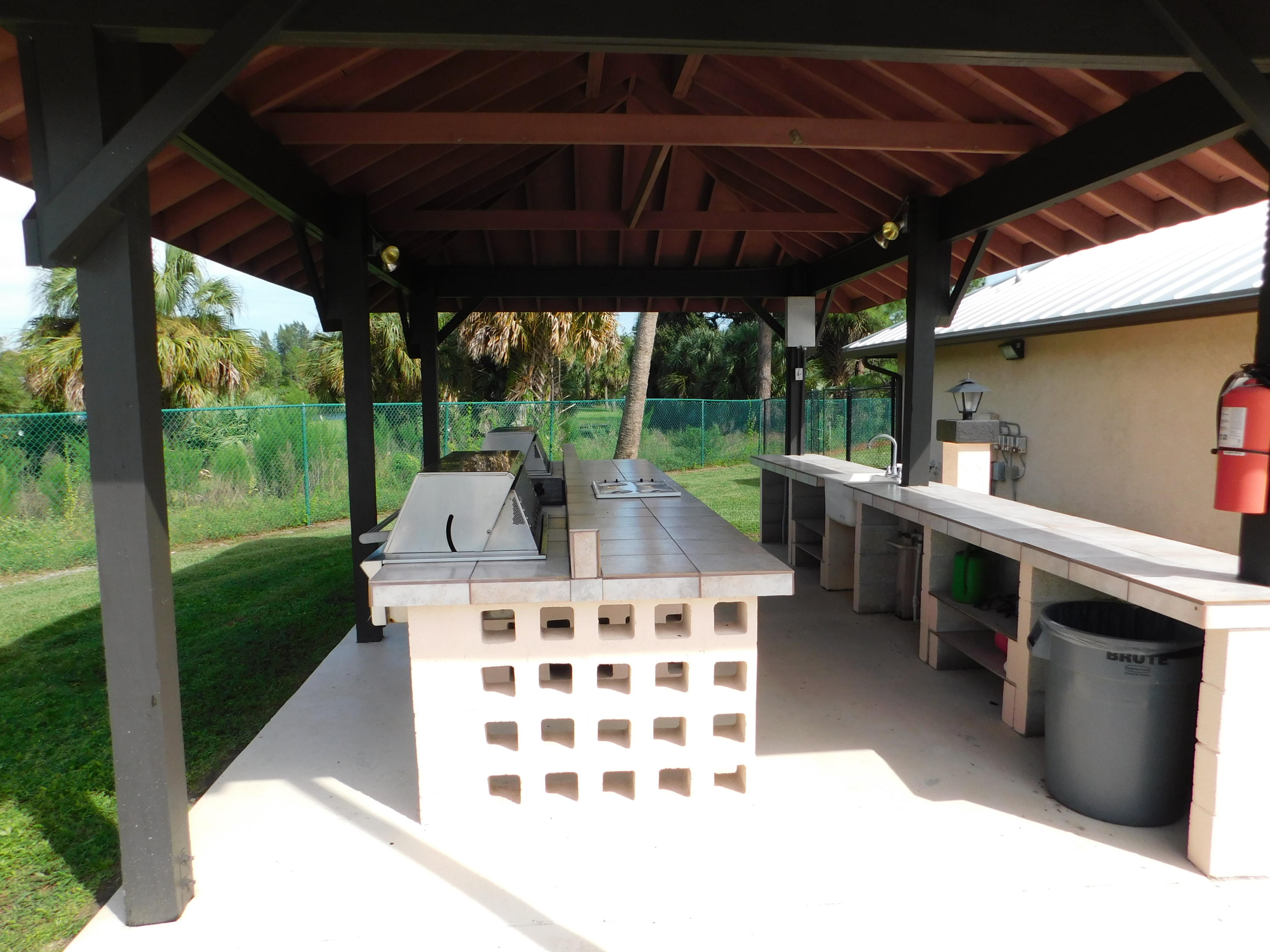 8925 Southwest Chevy Circle Stuart, FL 34997 - Photo 60 of 72 Club House outdoor Kitchen