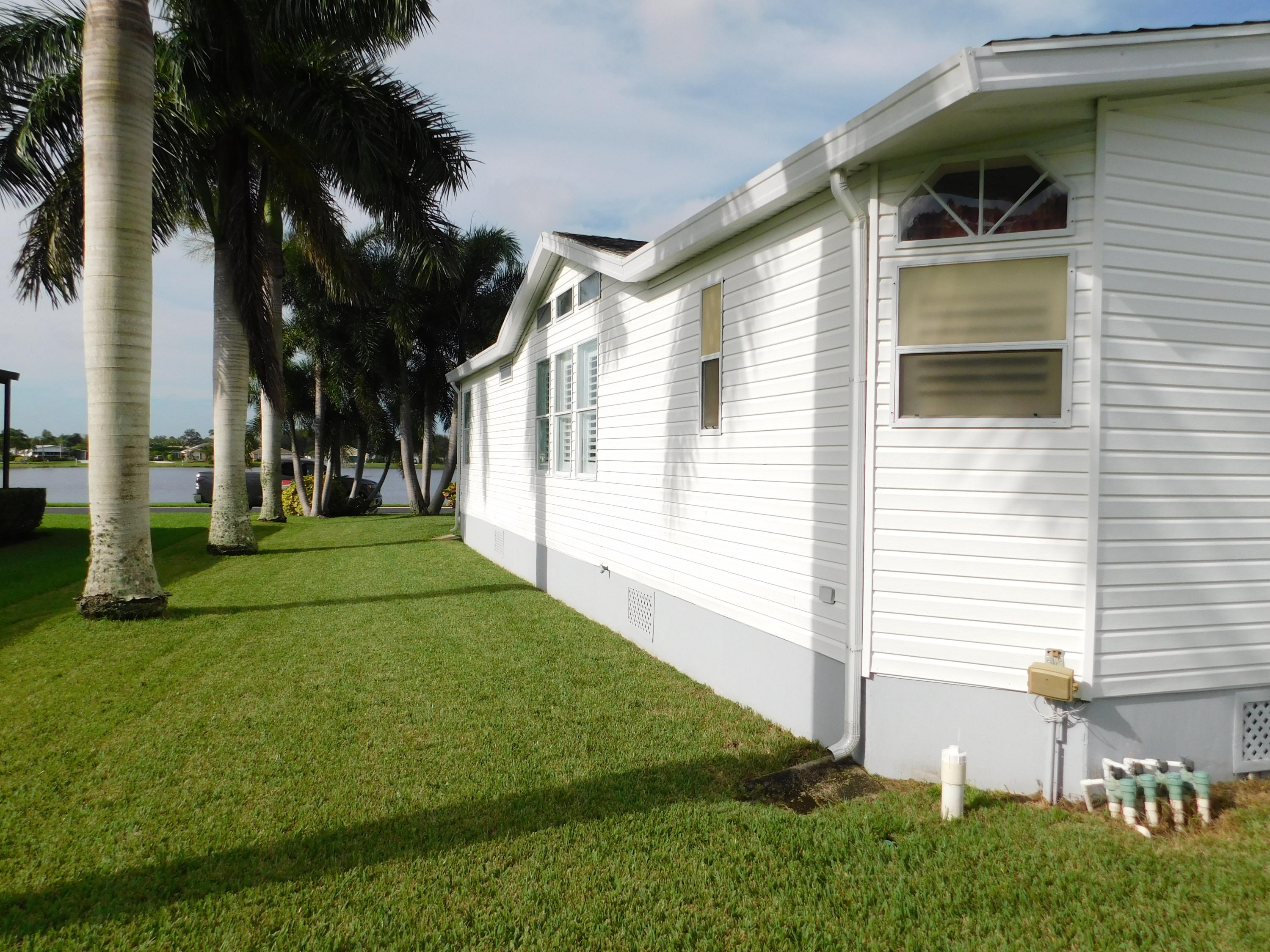 8925 Southwest Chevy Circle Stuart, FL 34997 - Photo 8 of 72 Side Yard
