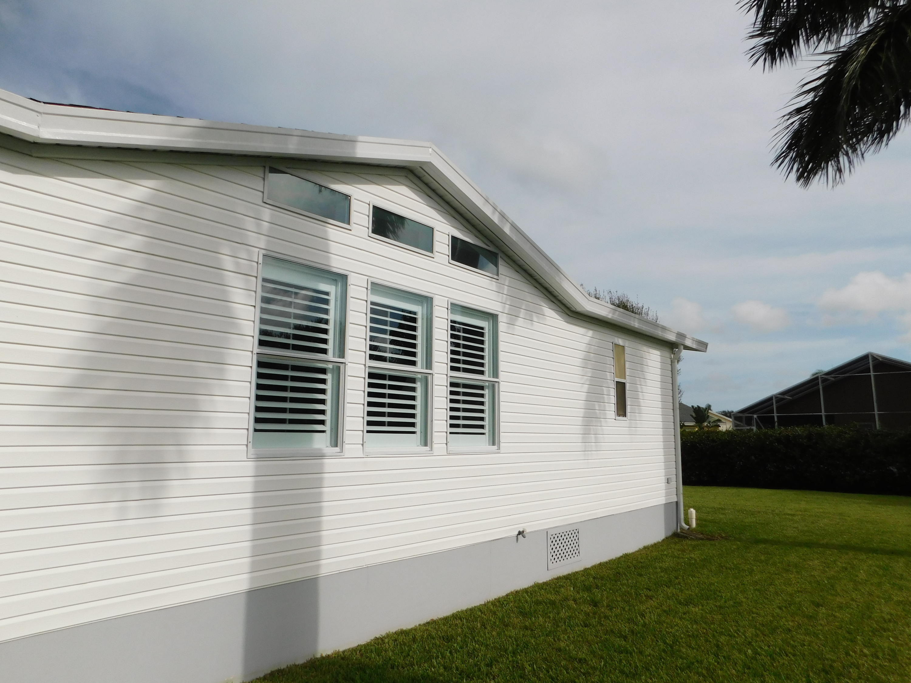 8925 Southwest Chevy Circle Stuart, FL 34997 - Photo 10 of 72 Side