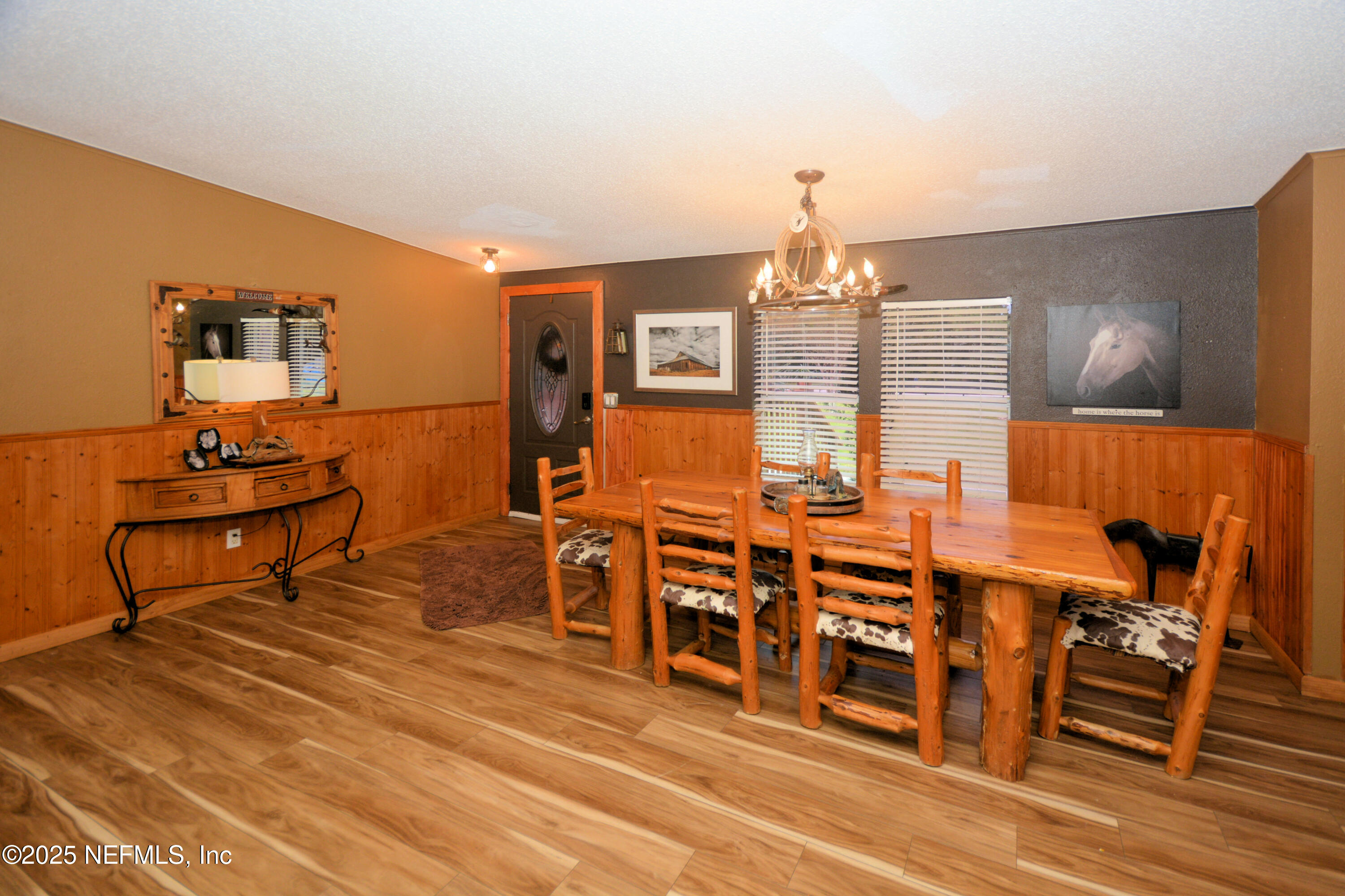2241 Marlee Road South Jacksonville, FL 32259 - Photo 11 of 61 a view of a dining room with furniture and chandelier