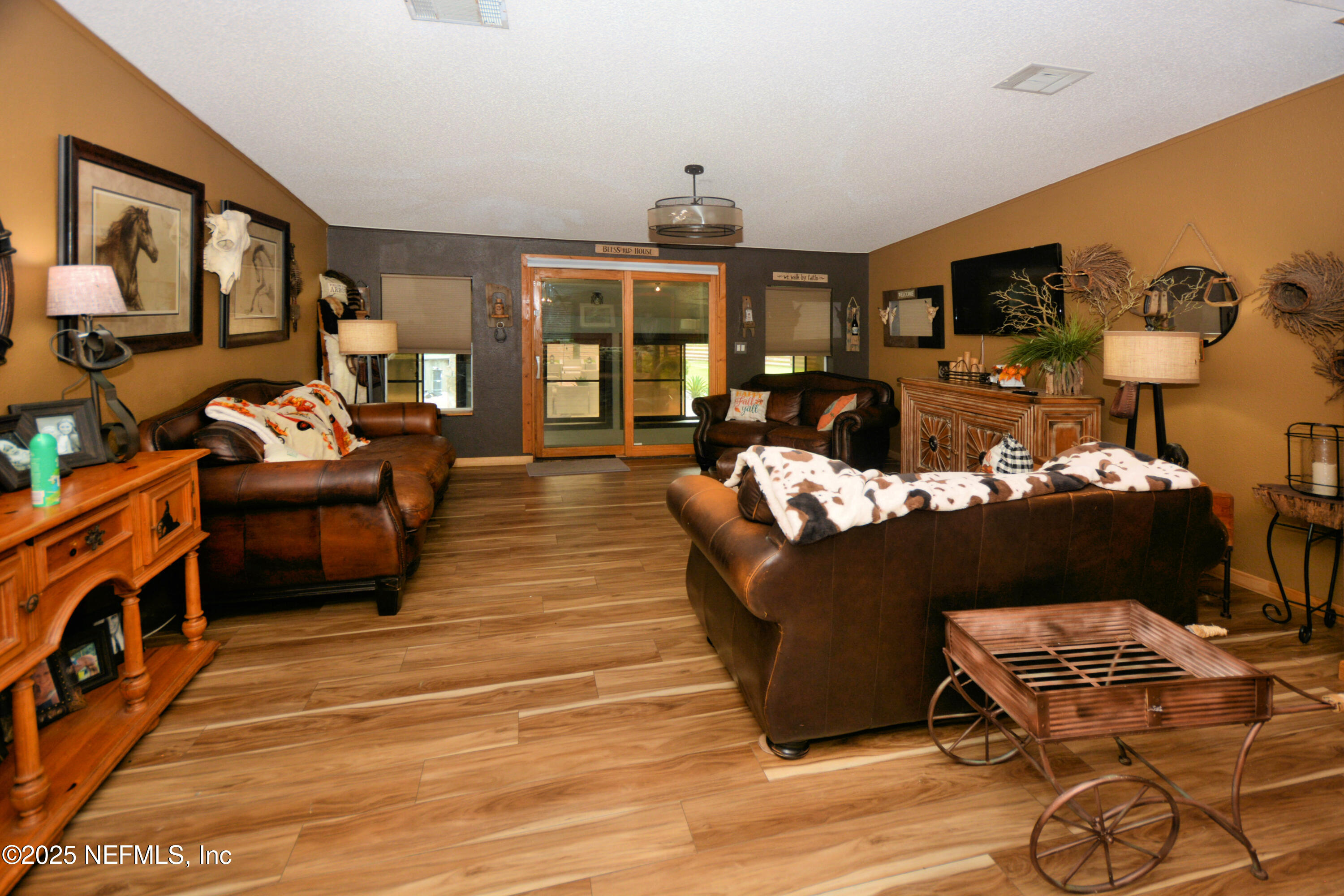 2241 Marlee Road South Jacksonville, FL 32259 - Photo 12 of 61 a living room with furniture windows and a flat screen tv