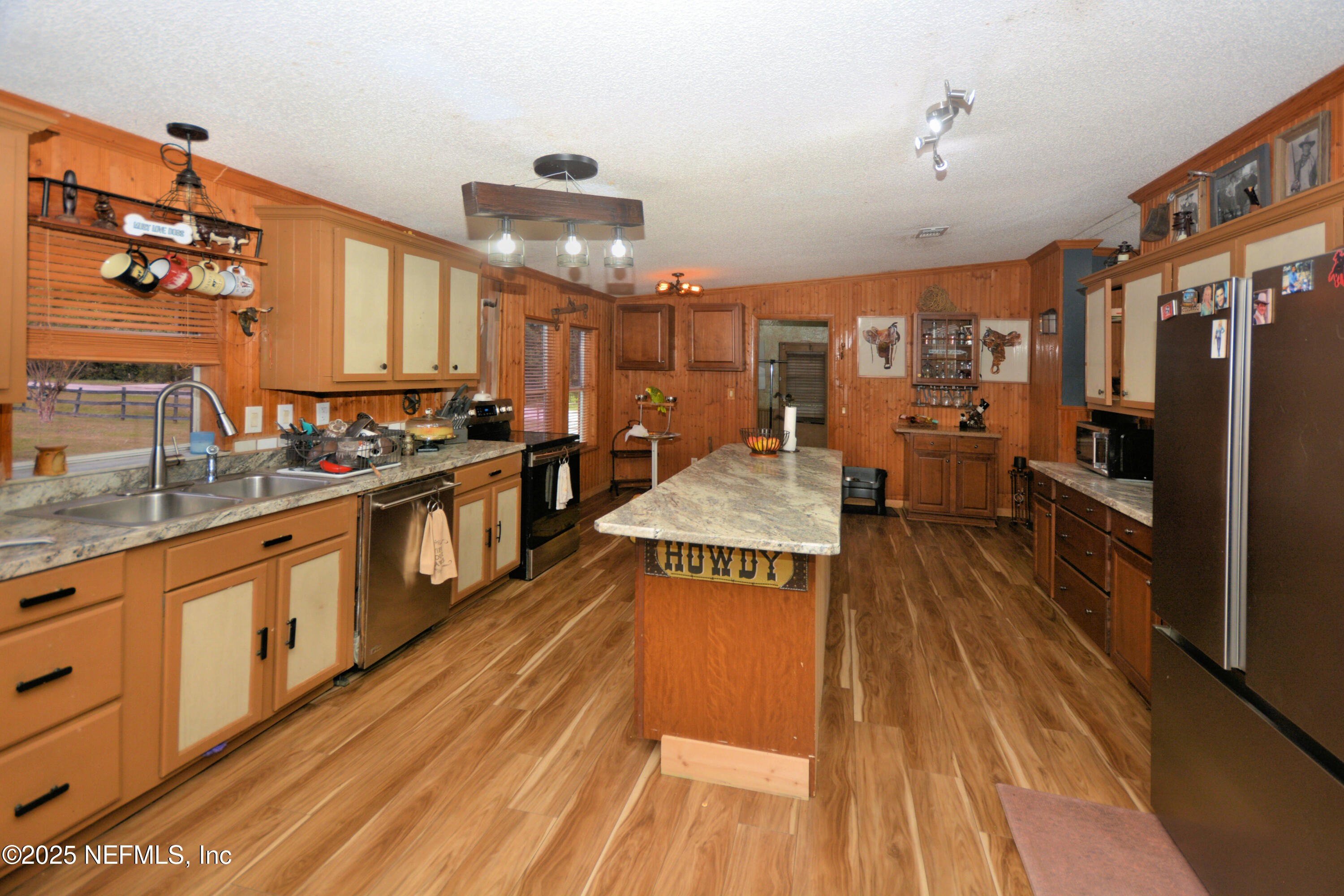 2241 Marlee Road South Jacksonville, FL 32259 - Photo 15 of 61 a open kitchen with stainless steel appliances granite countertop a lot of counter space and wooden floors
