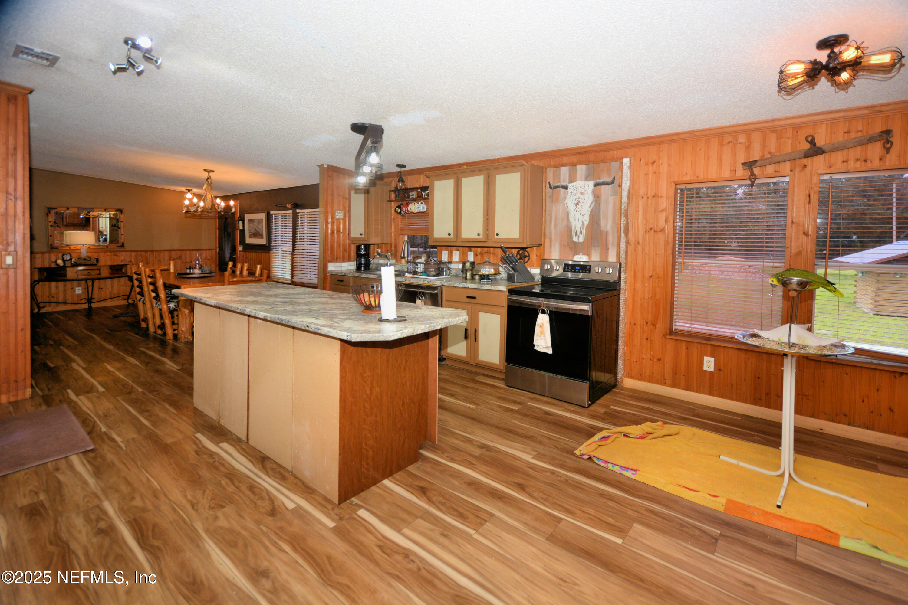 2241 Marlee Road South Jacksonville, FL 32259 - Photo 16 of 61 a kitchen with stainless steel appliances granite countertop a stove top oven and cabinets