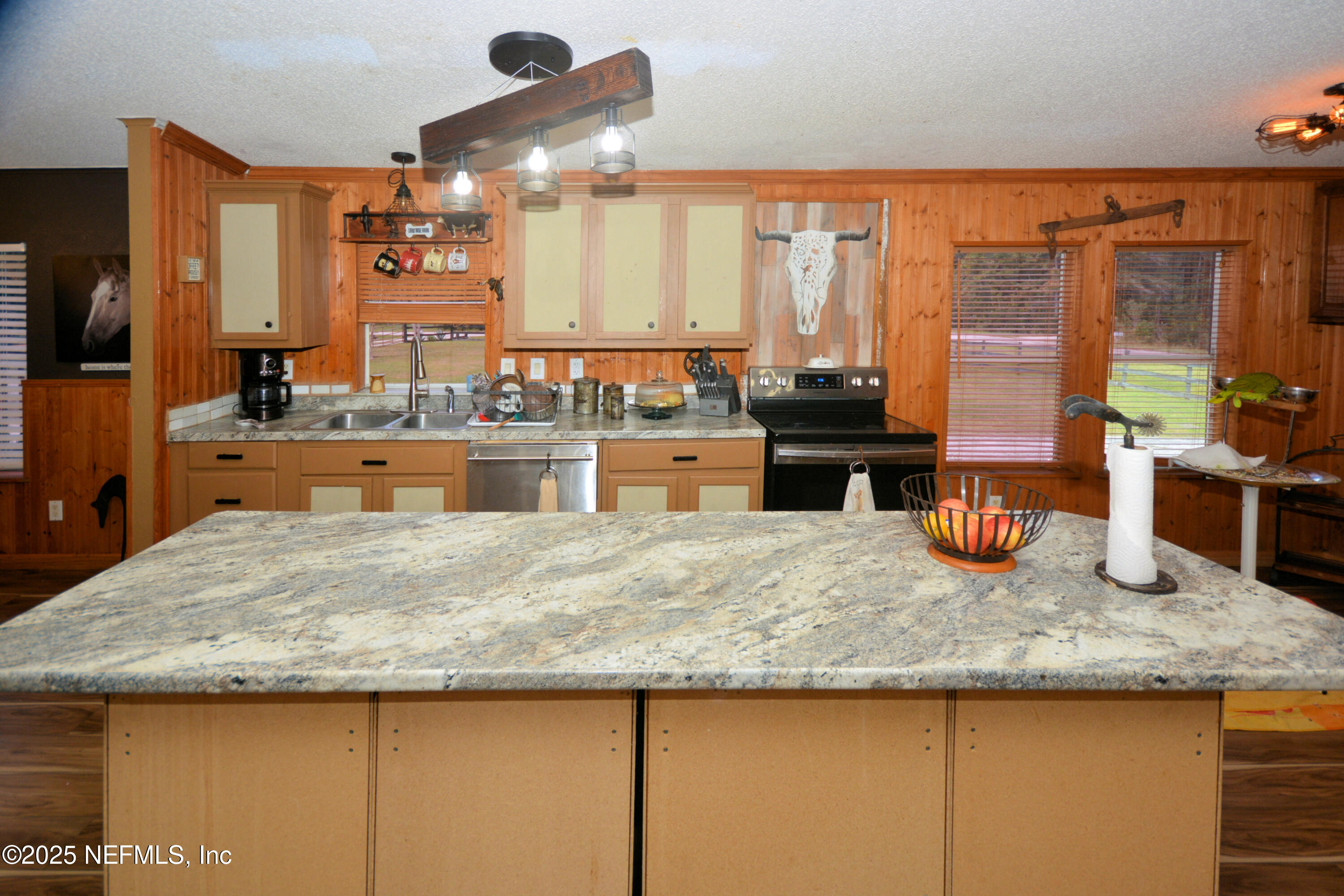 2241 Marlee Road South Jacksonville, FL 32259 - Photo 18 of 61 a kitchen with sink and wooden cabinets