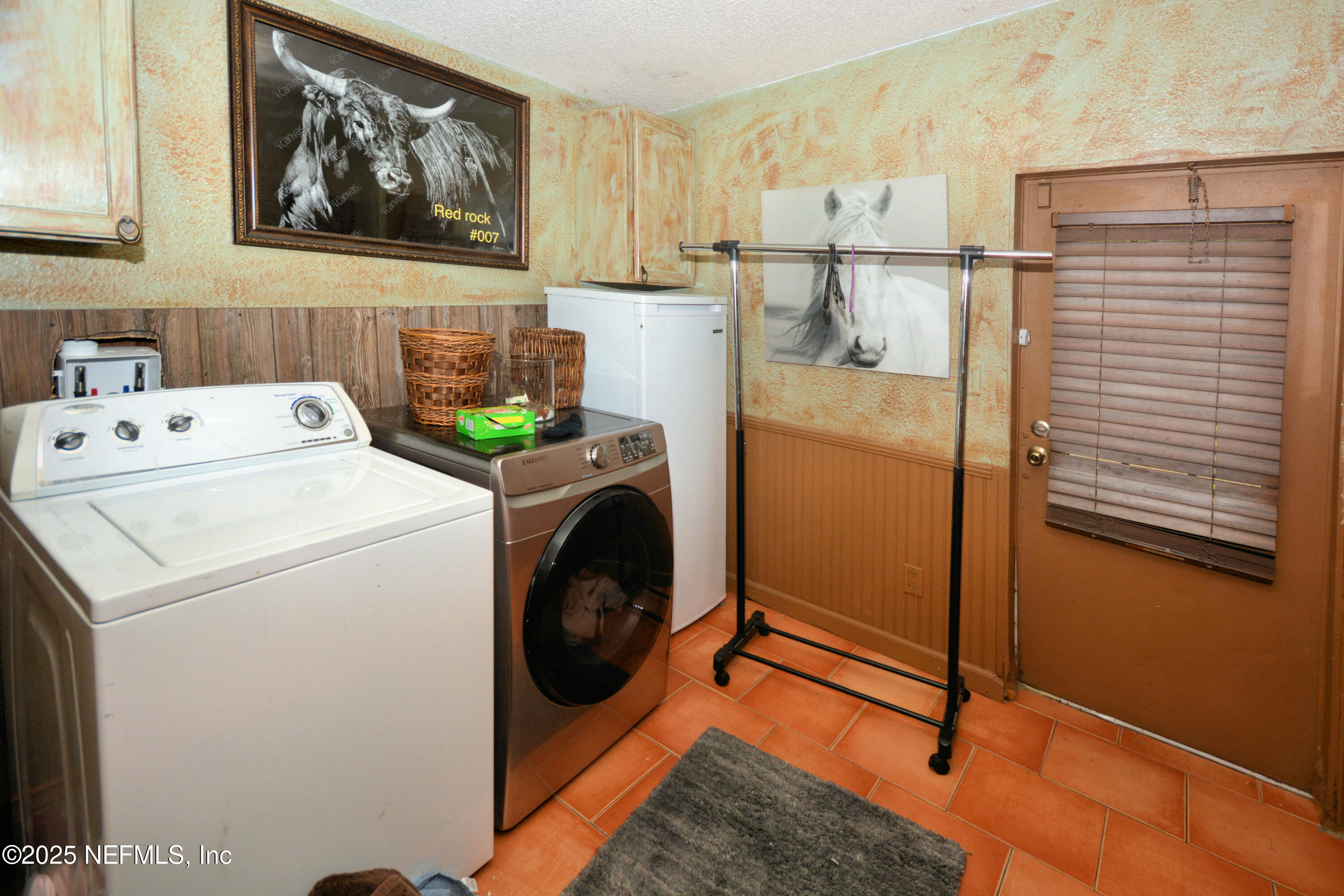 2241 Marlee Road South Jacksonville, FL 32259 - Photo 20 of 61 a utility room with dryer washer and a view of living room