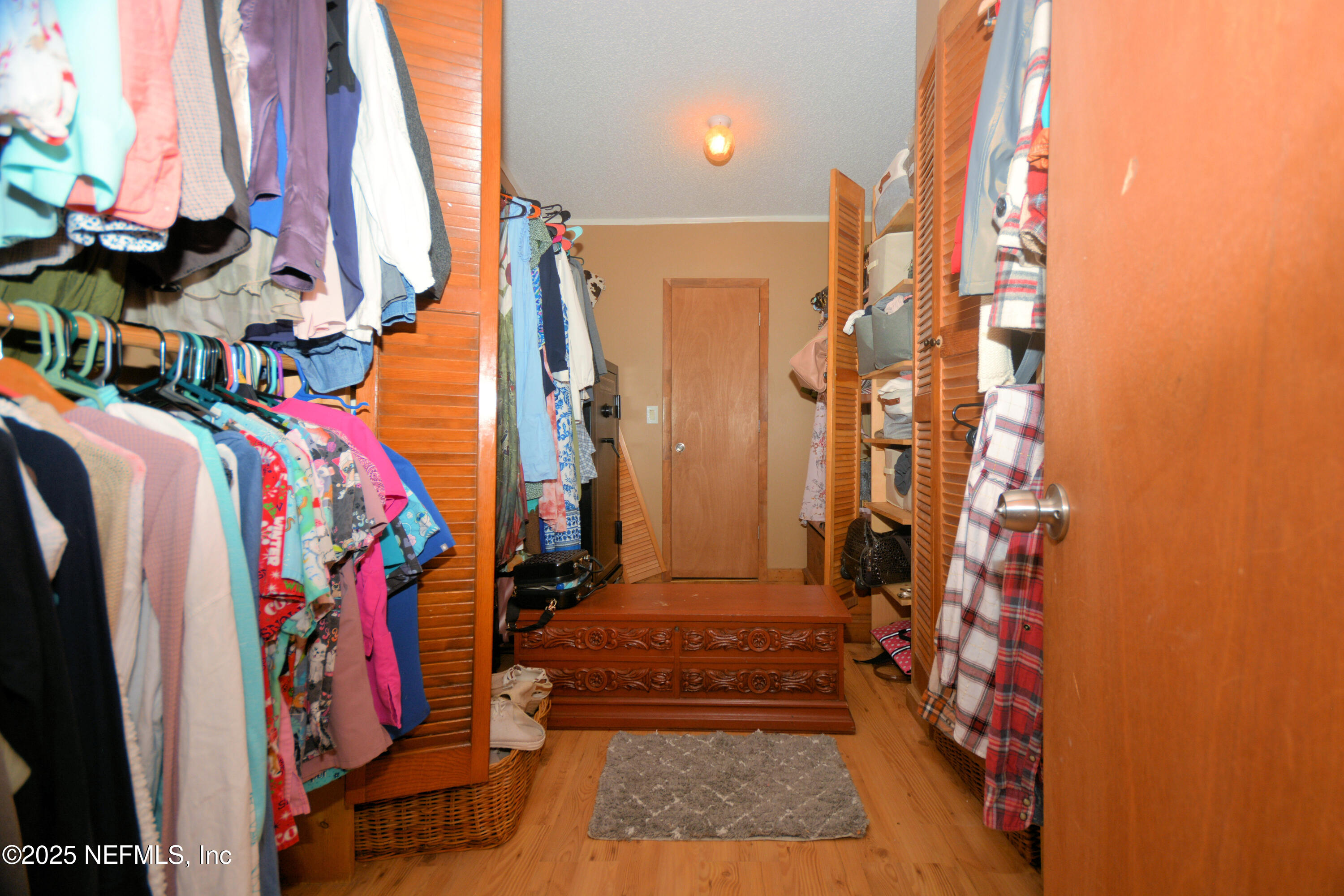 2241 Marlee Road South Jacksonville, FL 32259 - Photo 27 of 61 a view of walk in closet with clothes